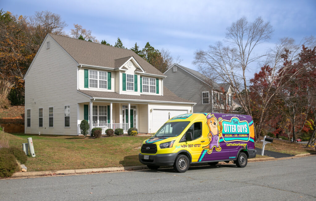 Otter van parked in front of house